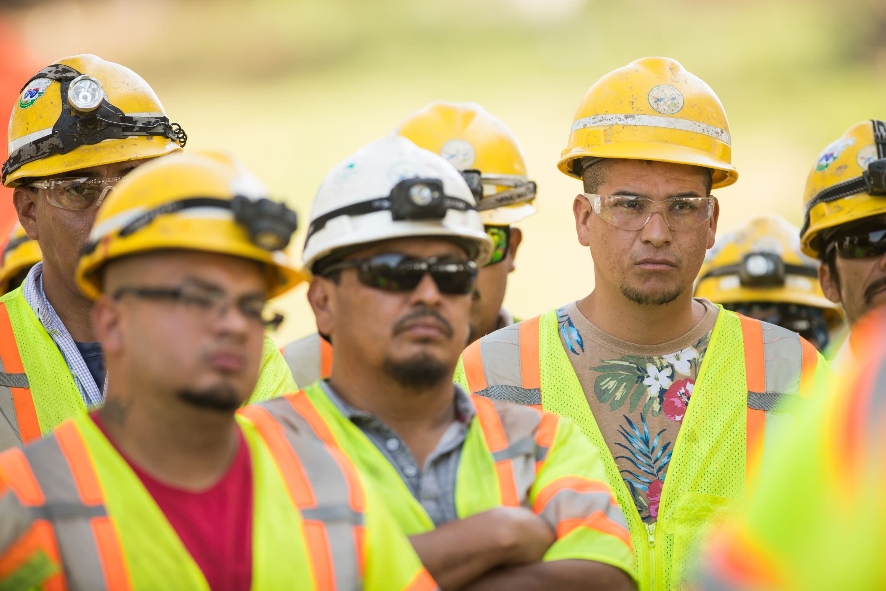 Workers at safety meeting