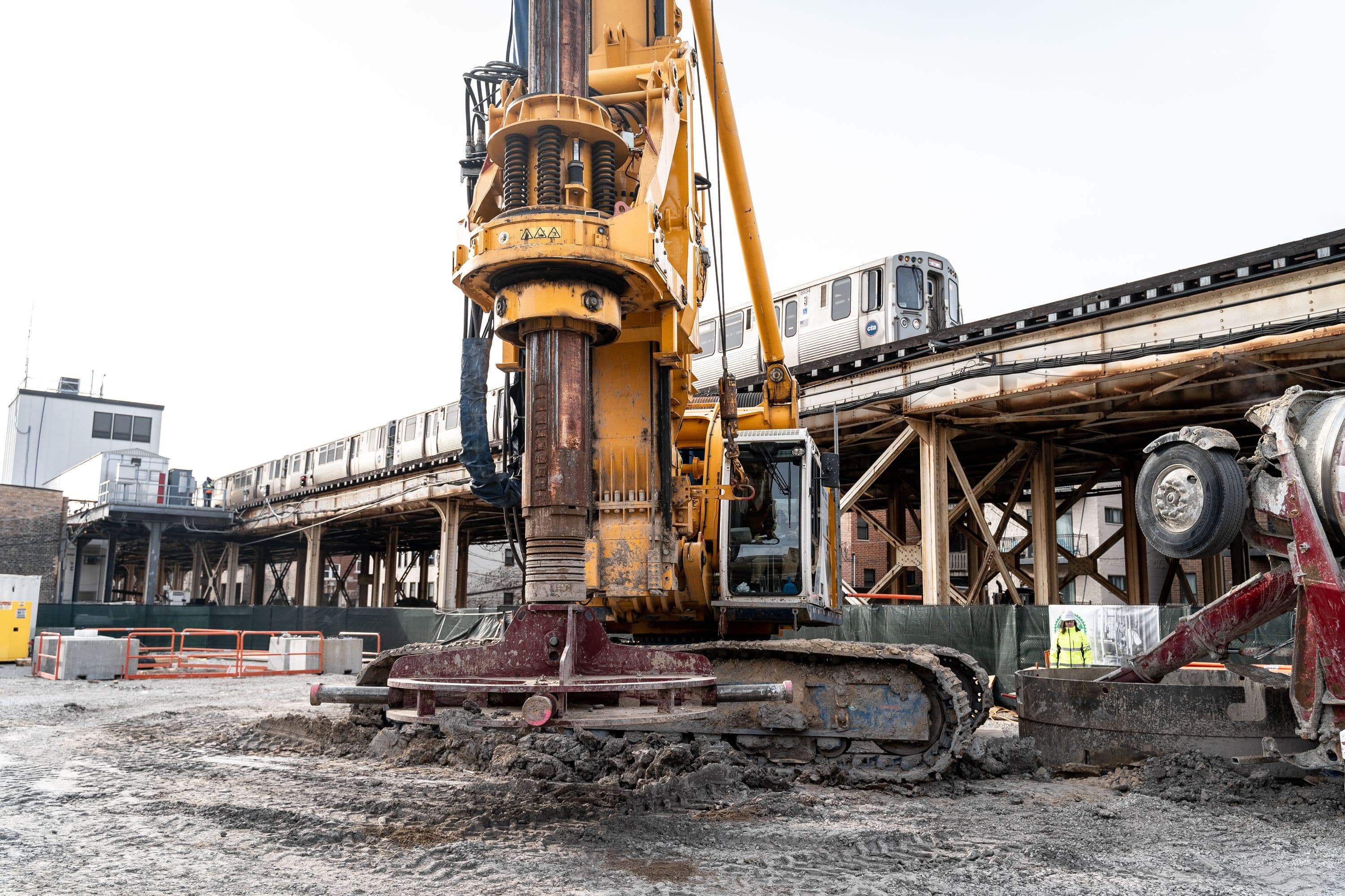 Construction With Trains Running Through