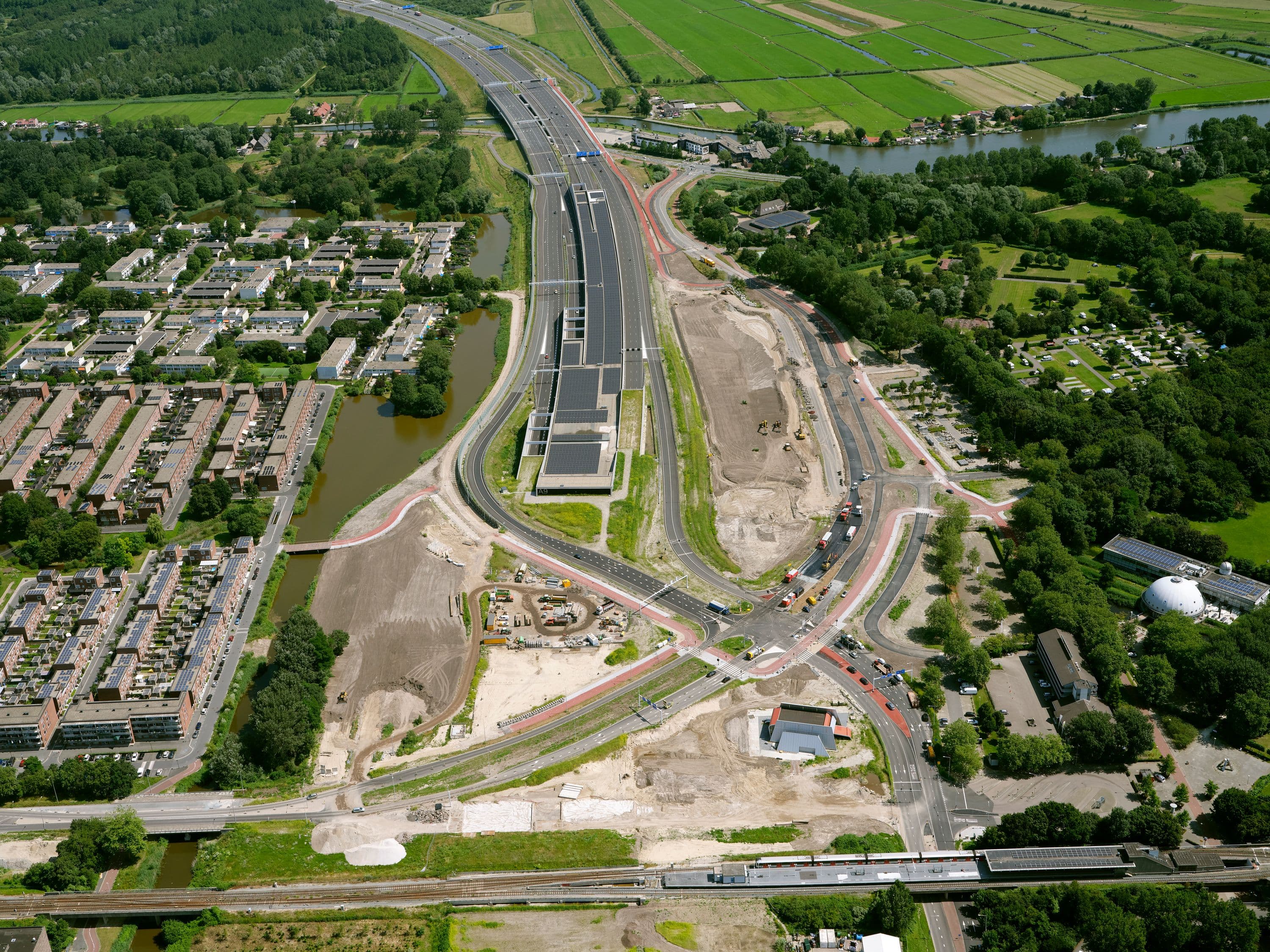 Aerial view of tunnel with solar panels