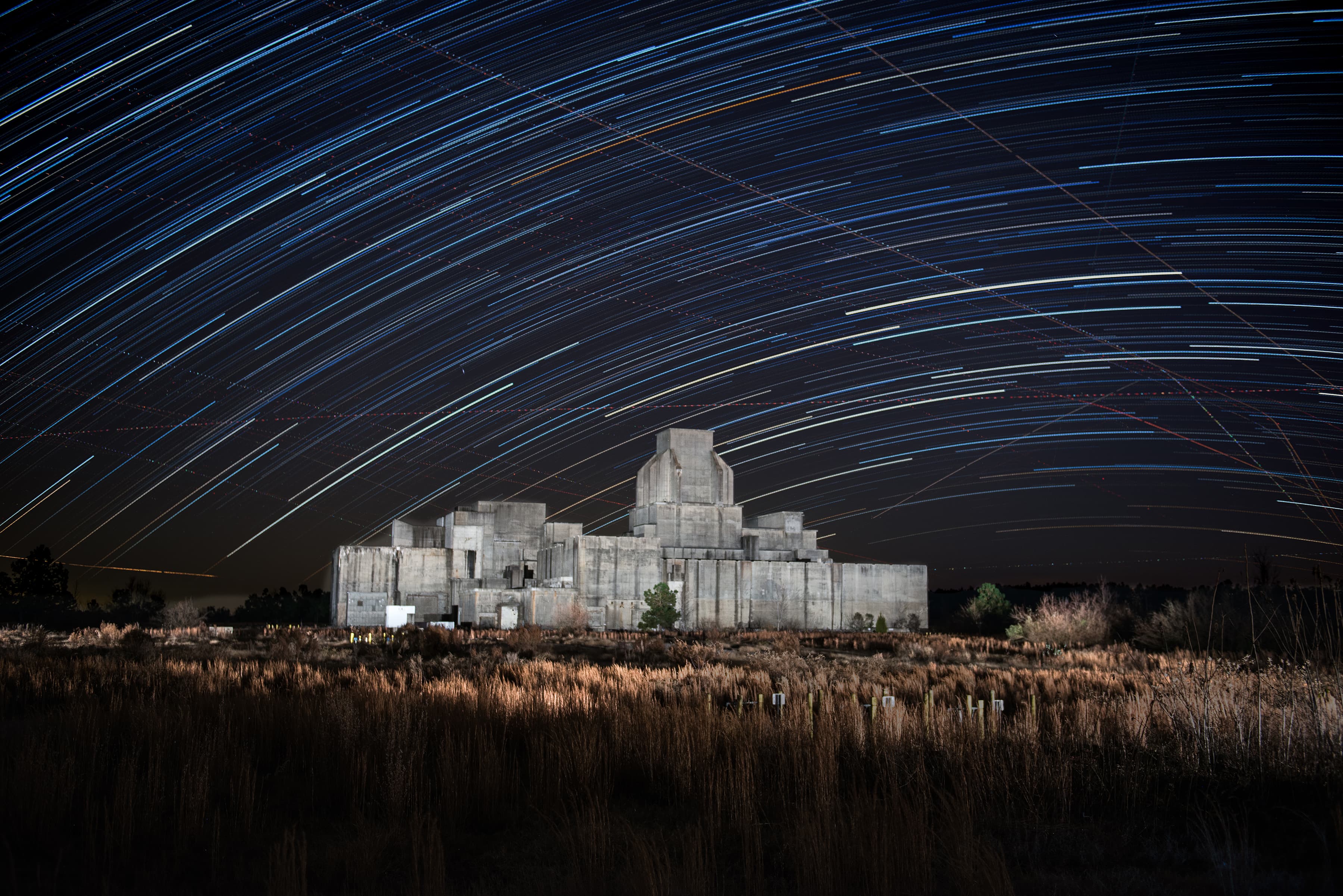 Time lapse  photo with stars passing over facility