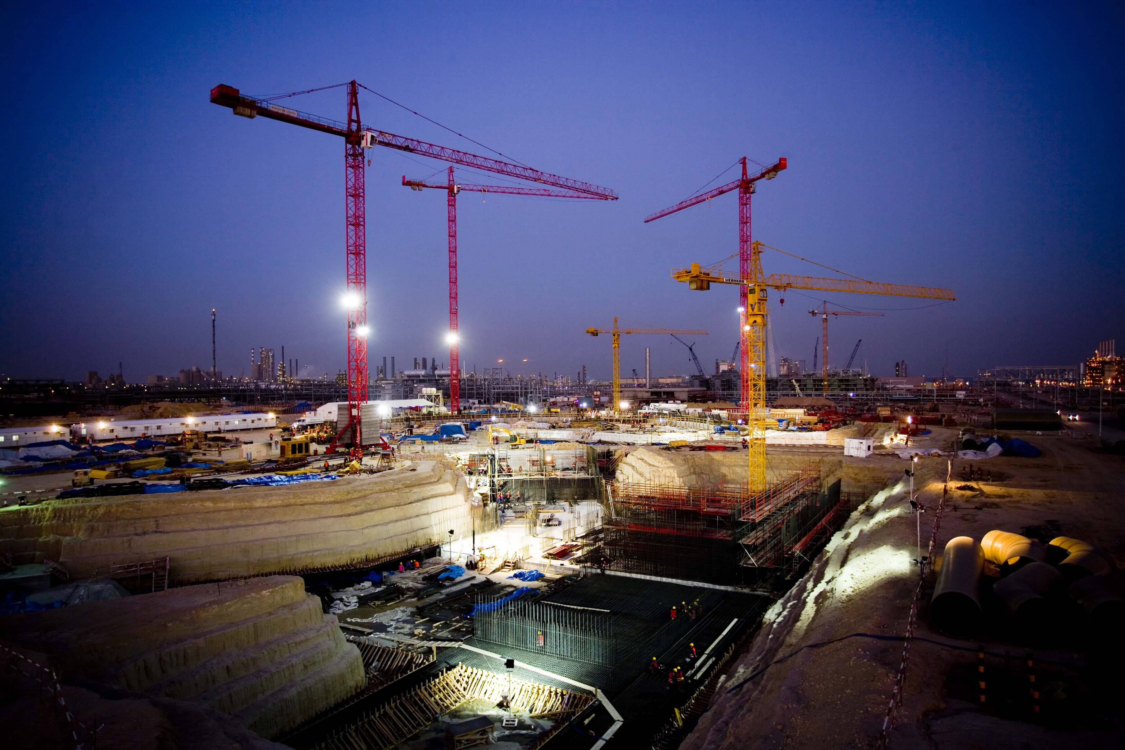 Photo of project site with tall crates at night